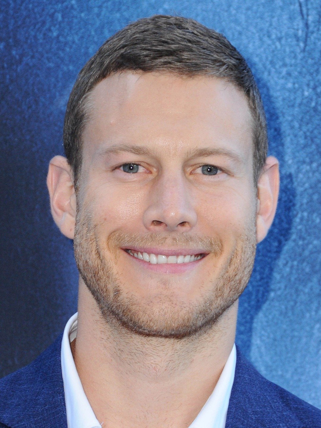 How tall is Tom Hopper?